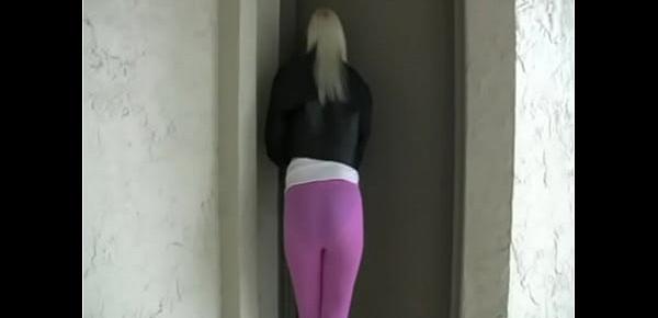  Blond girl pees her spandex leggings outside